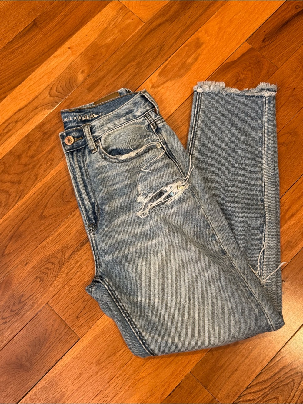 American Eagle Outfitters Keith Haring Light Wash High-Rise Ripped Jeans